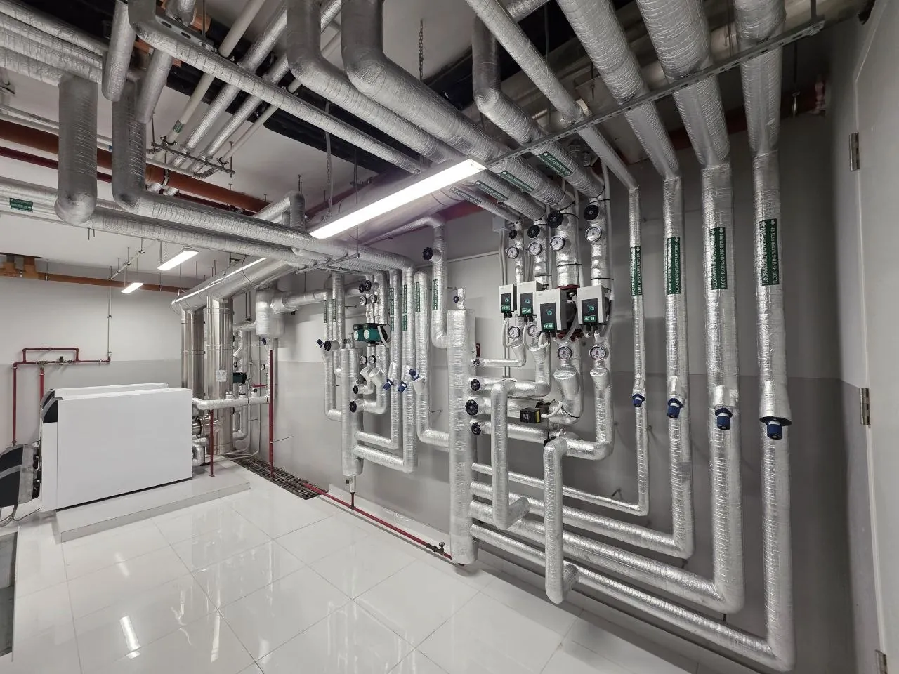 Villa Fawaz plant room - insulated piping manifolds, Rabieh